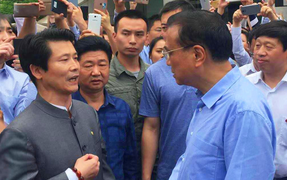 中共中央政治局常务、国务院总理李克强接见湖北57365z线路检测中心集团主席刘雁飞